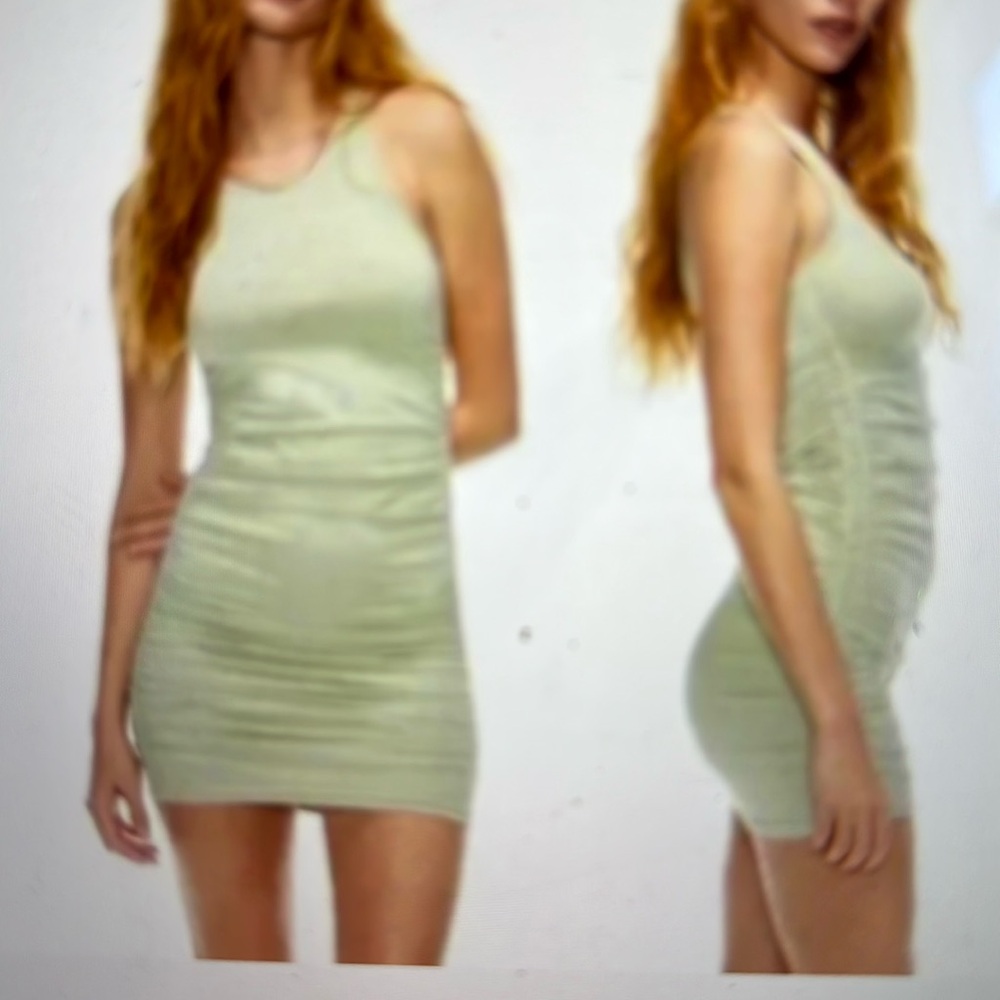 Aritzia crewneck tank dress with ruched sides.